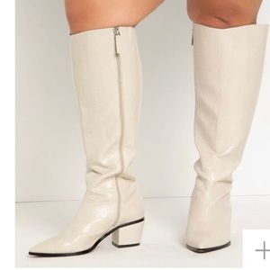 Tall white boots